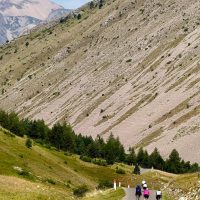 Big view, 3 riders, scree slope