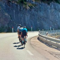 Group on balcony road, cliff edge, barriers
