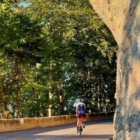 Solo rider,balcony road, cliff overhang, sunshine