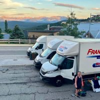 Stage finish, vans, mountain view, sunset
